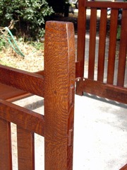 Close-up pegged thru-tenons on footboard post.